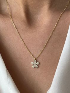 Minimalist flower for beautiful girls 🌸 Get this beautiful minimalist jewelry made with the quality of perfect elements✨ You can choose 925K Sterling Silver with the options of Gold, Rose Gold or White Gold colors. High quality jewelry for everyone 🤍  Details * 925K Sterling Silver Option → 14K Gold, Rose Gold or White Gold plated * Chain length is approximately 18 inches (16+2 in extender) / 45 cm (40+5 cm extender) * Time is everything! You will receive your package as soon as possible 🚚  * We care about the quality of metal to make sure it will last for a long time * We use enamel technique to color the jewelry and high quality zircons only * There can be tiny differences on each item. Length difference of the chain as well as color changes and shade differences of the stones and ena Dainty Flower Necklace For Anniversary, Dainty White Gold Flower Necklace, Dainty Flower Necklace Gift For Her, Time Is Everything, Chains Silver, Pineapple Jewelry, Cross Earrings Studs, Christmas Necklace, Stylish Rings