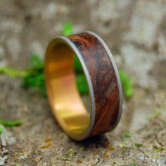 a wooden ring sitting on the ground