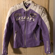 Icon Racing Kitty Jacket Size S Leather Outer Shell Lining Polyester Purple & White Purple Racer Jacket, White Sporty Biker Jacket With Long Sleeves, White Sporty Long Sleeve Biker Jacket, White Long Sleeve Sporty Biker Jacket, White Moto Outerwear For Streetwear, White Long Sleeve Biker Outerwear, White Long Sleeve Biker Jacket For Motorcycling, White Winter Outerwear For Biker Events, Casual White Motorcycle Outerwear