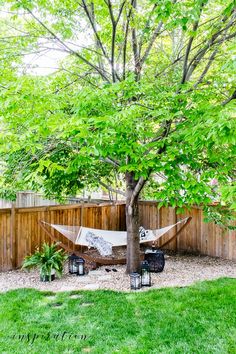 a hammock in the middle of a yard