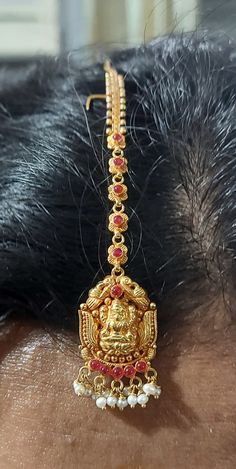 22 karat gold 'lakshmi' maang tikka with pearls & beads - papidi billa (temple jewellery) - 235-GT459 - in 4.650 Grams for USD $604.49 USD. 
Made in India by Totaram Jewelers Online this product is in Gold - 22 Karat BIS Hallmark 916 Gold  & is an excellent gift for Adult - Women. Ships fully insured with secured guaranteed delivery for free with your order over $250 from New Jersey USA & comes with 30 days exchange policy. Bollywood Style Yellow Gold Temple Necklace For Diwali, 22k Gold Temple Jewelry For Puja, Gold Plated Temple Necklace For Festivals, Heavy 22k Gold Temple Necklace In Bollywood Style, Temple Jewelry Style Tikka As Gift, Bollywood Style 22k Gold Temple Necklace For Festivals, Gold Traditional Wear With Intricate Design For Puja, 22k Gold Temple Necklace With Chandbali Shape, Gold Tikka With Latkans For Puja