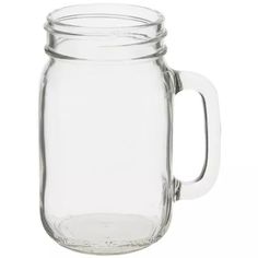 a large glass jar with a handle on the top and bottom, is shown in front of a white background