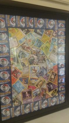 a framed poster with pokemon pictures on it