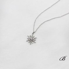 Elegant Snowflake Necklace For Anniversary, Wedding Diamond Jewelry With Snowflake Design, Elegant Christmas Diamond Jewelry, Elegant Snowflake Shaped Cubic Zirconia Jewelry, Elegant White Gold Jewelry For Christmas, Formal Snowflake Diamond White Jewelry, Diamond White Snowflake Jewelry For Formal Occasions, Elegant Snowflake Necklace For Formal Occasions, Elegant Snowflake Jewelry For Formal Occasions