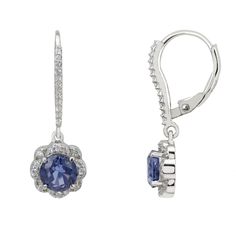 These earrings feature a beautiful floral-inspired design. Each earring has a round, lab-grown tanzanite stone surrounded by sparkling cubic zirconia forming a delicate flower. The secure latch back fastener, adorned with additional zirconia, adds extra sparkle. Tanzanite is the birthstone for December. It symbolizes transformation, intuition, and spiritual growth. The Matilda Drop Earrings make a thoughtful gift for birthdays, especially December birthdays, anniversaries, or any special occasio Elegant Tanzanite Earrings With Brilliant Cut, Tanzanite Round Earrings For Wedding, Elegant Tanzanite Dangle Earrings, Round Tanzanite Earrings For Weddings, Elegant Tanzanite Round Earrings, Tanzanite Round Wedding Earrings, Elegant Tanzanite Earrings, Elegant Round Tanzanite Earrings, Round Tanzanite Wedding Earrings