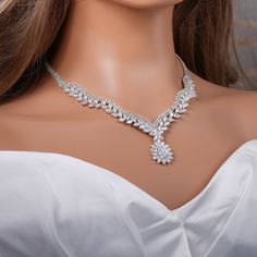 "Very romantic crystal bridal necklace, bracelet and earrings. Gorgeous diamond necklace set for your wedding day! Necklace measures about 18\" with an extension up to 20\" long. Earrings are about 1 1/4\" long and 3/4\" wide. Matching bracelet has an extension and will fit a wrist from 6\" to 8 1/2\". High quality guaranteed by GlamourBrideUSA! SHIPPING: Standard Shipping: 4-6 business days Priority mail Shipping: 2-3 business days *INTERNATIONAL ORDERS: PLEASE NOTE CUSTOMERS ARE RESPONSIBLE FO Silver Crystal Jewelry Sets For Brides, Bride's Silver Crystal Jewelry Sets, Elegant Bridal Jewelry With Rhinestones, Silver Crystal Bridal Accessories, Bridal Silver Cubic Zirconia Necklace, Silver Cubic Zirconia Necklace For Bride, Silver Cubic Zirconia Bride Necklace, Bridal Silver Crystal Necklace, Silver Crystal Necklace For Bride