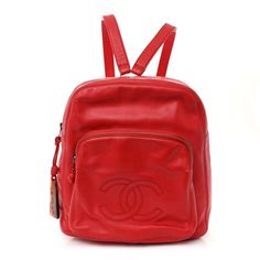 This is an authentic CHANEL Lambskin CC Timeless Backpack in Red.This backpack is finely crafted of luxurious lambskin leather in red.  The bag features red leather shoulder straps, and a front zipper pocket with a large stitched CC logo.  The main compartment opens with a tortoise resin zipper pull to a red fabric interior with zipper pockets. Red Leather Backpack With Zipper Closure, Designer Red Backpack, Luxury Red Backpack For Daily Use, Luxury Red Leather Backpack, Luxury Red Leather Standard Backpack, Luxury Red Backpack, Luxury Red Backpack For Travel, Chanel Backpack, Red Backpack