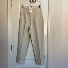 Nwt, Small, Beige Zara Classic Style Pants. Bit Small For Me On Waistline As I’m 126 Lb. Cream Tapered Leg Bottoms For Spring, Cream Tapered Leg Bottoms For Workwear, Tailored Cream Straight Pants, Cream Ankle-length Pants For Business Casual, Beige Spring Office Pants, Cream Business Casual Trousers, Cream Straight Pants For Work, Tailored Cream Pants, Cream Ankle-length Workwear Bottoms