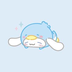 a cartoon character sleeping on top of a blue pillow with stars in the sky behind it