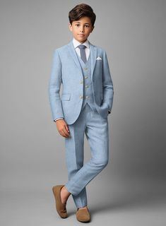 Dress your little gentleman in timeless elegance with our Tropical Blue Linen Boys Suit. The suit is a must have summer tailored outfit as it's about your own personal climate control system. Crafted from a pure linen, the textured fabric will make you a summer star, an ideal suit for cruises and beach weddings that keeps you cooler and more comfortable in the heat. 
 
Look Includes   Tropical Blue Linen Fabric  Two Button Jacket Style  Notch Lapel   Corozo Ivory Buttons  Single Vent  Three Cuff Fitted Blue Linen Suit, Classic Blue Linen Suits, Blue Linen Single Breasted Suit, Blue Single-breasted Linen Suit, Tailored Single-breasted Blue Suit, Grey Check Suit, Light Blue Suit, Herringbone Tweed Jacket, Herringbone Jacket