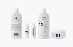 the packaging design is white and has black numbers on it, along with three bottles