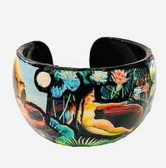 "Henri Rousseau was a wonderful self taught French painter. He darter taking painting more seriously in his Forties and is celebrated today for his unique style and visionary artwork. I find his work dreamlike and exotic. Perfect gift for an artist, art lover, teacher, decorator or fashionista. Definitely a conversation piece. The detail of this bracelet will fascinate you. Sad use: 2 3/4\"x 1 1/2\". Open in back is 1 1/4\" to slide your wrist through ( it opens a little more too). I used several of Rousseau most famous works. I want to visit his jungle and lay on that couch myself sometime." Lovers Bracelet, Hippie Bracelets, Gifts For An Artist, Outsider Art, Naive Art, Art Collector, Conversation Piece, Bracelet Gift, Art Gift