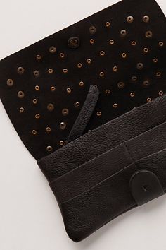 Designed to add a little something extra to a forever classic style, this so cool wallet is featured in a staple fold-over silhouette and luxe leather fabrication with defined stud detailing throughout and ample interior pockets for holding anything from credit cards to cash and everything in between. | Studded Pulito Wallet Bag by FP Collection at Free People in Black Chic Leather Clutch With Interior Card Slots, Chic Leather Bifold Wallet, Chic Leather Bifold Bags, Chic Bifold Leather Bag, Chic Leather Clutch With Card Slots, Chic Leather Wallets With Card Slots, Chic Clutch Wallet With Snap Closure, Leather Clutch With Snap Closure For Travel, Chic Leather Clutch With Snap Closure