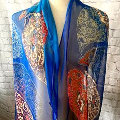 Beautiful, bright silk scarf in good vintage condition with no known issues.  Please examine pictures carefully before purchasing.  All items are sold as is. Blue Vintage Silk Scarf, Vintage Blue Silk Scarf, Blue Vintage Silk Scarf For Gift, Vintage Blue Silk Scarf As Gift, Vintage Blue Silk Scarf For Gift, Traditional Blue Silk Shawl Scarf, Traditional Blue Silk Shawl, Blue Silk Scarf With Paisley Print, Blue Paisley Print Bohemian Scarf