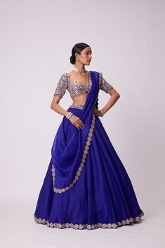 Persian Blue Organza Hand Embroidered Lehenga And Dupatta Clubbed with Real Hand Cut Mirror Embroidered Elbow Sleeve Length Blouse.From Vvani Vats Jugmug's collection.DELIVERY TIMEPlease allow 8-12 weeks for your outfit to arrive.FABRIC DETAILSLehanga - Organza Dupatta - OrganzaBlouse - GeorgetteProfessional cleaning only. Blue Indian Outfit, Blue Indian Dress, Trendy Lehenga Designs, Lehenga Simple, Cotton Suit Designs, Haldi Outfits, Trendy Outfits Indian, Blue Organza, Bridesmaid Saree