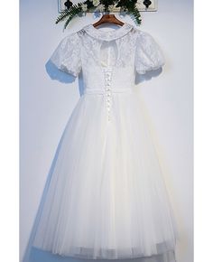 Buy cute baby collar white lace tea length party dress with short sleeves at cheap price online. Free stable shipping and pro custom service since 2009. Elegant Summer Lace Dress For First Communion, Fitted Lace Dress For First Communion Summer, Short Sleeve Lace Dress For Confirmation, Short Sleeve Lace Confirmation Dress, White Lace Dress With Lace Collar For Party, Lace Dress For First Communion With Short Sleeves, White Short Sleeve Confirmation Dress, White Short Sleeve Dress For Confirmation, Elegant Short Sleeve Dress For First Communion