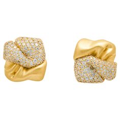 Diamonds, Champagne Diamonds 18 Karat Yellow Gold Stud Earrings Crafted with a sense of energy and movement, our Silk Earrings capture the essence of crumpled fabric. Half of the Studs are formed from 18K Matte Yellow Gold, while the other is adorned with a dazzling mix of 262 Brown and 46 White Diamonds, totaling more than 0.80 Carats. An exciting pairing! 10.70 x 11.20 mm (WxH) Weight - 5.69 gm. Silk Earrings, Yellow Gold Stud Earrings, Yellow Gold Earrings, Gold Stud Earrings, Earring Crafts, Champagne Diamond, Yellow Gold Earring, Gold Stud, Gold Studs