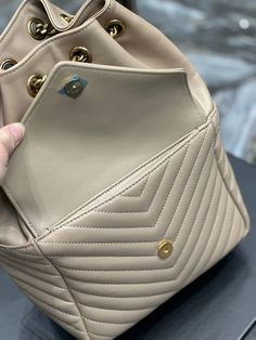 Size: 22cm*29cm*15cm It comes with Dust box, Care manual, Tag, and Paper bag. High-end Beige Bucket Bag, Designer Beige Bag For Errands, Designer Large Capacity Pouch Bucket Bag, Designer Beige Box Bag For Shopping, Designer Shoulder Bag Backpack Style, High-end Cream Travel Bag, High-end Daily Backpack, High-end Everyday Backpack Shoulder Bag, High-end Backpack Style Shoulder Bag