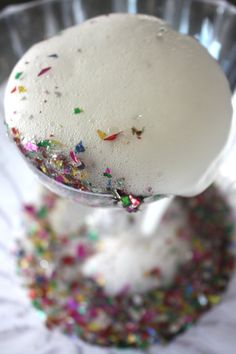 a scoop of ice cream with sprinkles on it