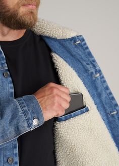 American Tall Men's Denim Sherpa Jacket in Stonewash Blue. Shell is 100% Cotton and the Sherpa lining is 100% polyester. Regular fit. Authentic, non-stretch denim with a cozy Sherpa lining and collar. Top stitch detail for added style. Buttoned placket and cuffs. Side hem adjusters. Chest flap pockets with button closure and front slant pockets. Hidden inner chest pocket. Pre-washed to control shrinkage. A classic denim jacket, upgraded for the colder months. MORE DETAILS:Instantly bring the coo Denim Sherpa Jacket Outfit, Sherpa Jacket Outfit, Denim Sherpa Jacket, Men Denim Jacket, Blue Shell, Classic Denim Jacket, Extra Long Sleeves, Denim Jacket Men, Sherpa Jacket