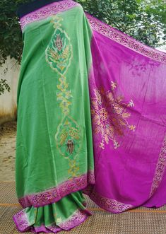 Category: Moonga Silk Saree Get ready to wear this stunning Banarasi silk saree. Woven with passion and excellence, this Handloom Banarasi silk saree won't fail to catch attention. Moonga silk sarees are known for their longevity and resilience, they make you fall in love with them. Color -Green & Purple with hand brush Weave -Cutwork Blouse- Plain with zari border Note- There may be slight color variations due to photographic reasons. This is a hand-woven product and any irregularities in the w Bohemian Style Pre-draped Saree In Slub Silk, Bohemian Style Pre-draped Slub Silk Saree, Bohemian Pre-draped Saree In Slub Silk For Diwali, Bohemian Style Slub Silk Pre-draped Saree For Diwali, Traditional Green Slub Silk Saree, Festive Bohemian Tussar Silk Pre-draped Saree, Bohemian Art Silk Pre-draped Saree For Diwali, Pista Green Raw Silk Handloom Saree, Unstitched Green Raw Silk Saree