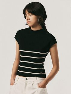 Composition : POLYESTER 81% WOOL 15% NYLON 4%Color : WHITE, BLACKCountry of Origin : CHINA Fitted Black Top With Vertical Stripes, Classic Knit Tops With Striped Collar, Fine Knit Striped Tops For Spring, White Elegant Top With Contrast Stripes, Chic Striped Hem Top For Fall, Elegant White Top With Contrast Stripes, Striped Fine Knit Crew Neck Top, Striped Fine Knit Casual Tops, Casual Striped Fine Knit Tops