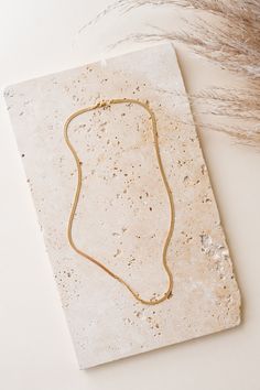 Named Herra after the Greek Queen of the Gods, Hera, this Herringbone chain is the perfect thing to wear everyday! 14K gold fill 18" chain length 2.4mm bold thickness Handmade in Eau Claire, WI by Hello Adorn