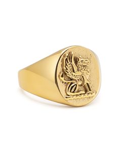 Ring in Stainless Steel with Gold Plating Product Code: MRING_140 Designer's Notes The crest ring is a traditional ring design that is a must for every gentleman. The beautifully hand-crafted crest in our ring features a lion. The lion is a common charge in heraldry. It traditionally symbolizes courage, nobility, royalty, strength. Please note that all our pieces are crafted by hand and one-of-a-kind, and may therefore vary slightly in size, shape, and color. Luxury Wedding Engraved Intaglio Ring, Lion Crest, Gold Signet Ring, Stainless Steel Polish, Linking Rings, Engraved Logo, Engraved Necklace, Signet Ring, Gold Plating