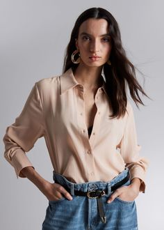 Mulberry silk shirt designed with a classic turn-down collar, long sleeves and a buttoned front.• Loose fit• Curved hemline• Pleated, buttoned cuffsLength of shirt:  66cm / 26" (EU 36 / UK 8 / US 4) Chic Silk Shirt With Hidden Button Closure, Chic Semi-formal Blouse With Lapel Collar, Chic Formal Shirt With Collared Neckline, Chic Semi-formal Button-up Shirt, Chic Single Breasted Tops For Business Casual, Classic Single Breasted Collared Blouse, Semi-formal Button-up Blouse For Fall, Semi-formal Fall Button-up Blouse, Chic Shirt With Concealed Placket And Spread Collar