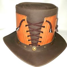 Full Grain Cowhide Unisex Leather Tophat Brand-New. Size: S, M, Brown Leather Hat Band With Sweatband, Brown Leather Top Hat For Rodeo, Brown Steampunk Brimmed Hats, Steampunk Brown Brimmed Hats, Steampunk Style Brown Brimmed Hat, Steampunk Brown Adjustable Hat, Brown Leather Wide Brim Top Hat, Brown Leather Top Hat With Short Brim, Brown Brimmed Top Hat For Outdoor