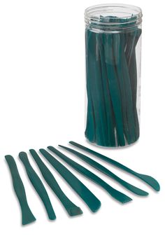 green plastic forks and spoons in a jar