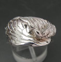 Here is an old design of mine that I carved many years ago in San Diego, California. It is a replica of a breaking wave. Weighs 7 grams and measures 8.75mm at the widest point. Show in a size 6, and available in all sizes from 4 through 12. I also show this in a larger version for men or women and also show them as a set. These were originally designed as a wedding set. Both rings are also available with white diamonds set in the break of the wave. This is also available as another option for an Turquoise Jewelry Set, Flush Set Diamond, Gold Wave Ring, Gold Waves, Wave Ring, Ring Hand, Gold Hand, White Gold Jewelry, Gold Hands