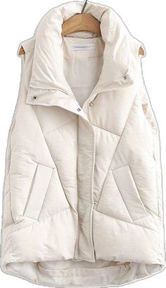 Sleeveless Vest For Cold Weather In Fall, Sleeveless Puffer Vest For Cold Weather, Winter Cotton Sleeveless Vest, Solid Sleeveless Vest For Winter, Cold Weather Sleeveless Vest Outerwear, Sleeveless Vest For Winter Cold Weather, Winter Sleeveless Vest For Cold Weather, Sleeveless Vest For Cold Weather And Winter, Winter Cold Weather Sleeveless Vest