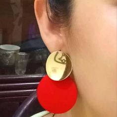 Pretty Gold & Red Disc Earrings Red Round Metal Earrings, Trendy Red Circular Jewelry, Modern Red Round Earrings, Trendy Red Metal Earrings, Bold Red Drop Earrings, Trendy Red Party Earrings, Modern Red Earrings For Party, Modern Red Party Earrings, Chic Red Earrings