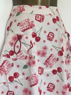 "Cute flared cherry skirt in a retro style   White Red Cherries Pattern A-Line Unlined 97% cotton, 3% elastane Back zip closure   Available in Size UK S  UK S = UK 8 Across the waist 14\" / Across the hips 24\" / Total length 25.5\" Brand new with tags" White Retro Full Skirt, Retro White Full Skirt, White Retro Cotton Skirt, Retro Red Cotton Skirt, Retro Cotton Skirt, Cherry Skirt, 60s Skirt, White And Red, Retro Style