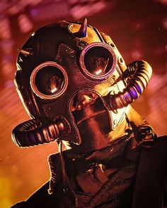 a man in a gas mask with goggles