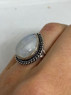 Large Vintage ring set with huge genuine Rainbow Moonstone. Low content silver not sterling. Size 9 I can re size it for a jeweler's fee of $20 All rings are shipped in a nice gift box. Check out our over a THOUSAND great reviews Engraving is $4 per letter and is not always perfect depending on the piece. It can take a few days if the jeweler is busy. This is payable to Paypal Judithsltd@gmail.com Silver Teardrop Moonstone Ring For Anniversary, Moonstone Crystal Ring With Large Stone For Gift, Moonstone Open Ring With Large Stone As A Gift, Silver Opal Ring With Large Stone For Anniversary, Silver Moonstone Ring With Stone Setting As Gift, Gift Moonstone Ring With Large Stone, Silver Moonstone Ring For Jewelry Making, Silver Rings With Large Stone For Gift, Gift Crystal Ring With Large Moonstone