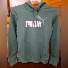 Puma Women’s Hoodie/Sweatshirt. Size Small. Green In Color. New With Tags. Sporty Logo Print Hoodie For Loungewear, Casual Logo Print Sweatshirt For The Gym, Casual Sweatshirt With Logo Print For Gym, Casual Gym Hoodie With Logo Print, Puma Logo Crew Neck Sweatshirt For Streetwear, Casual Puma Logo Sweatshirt For Winter, Casual Puma Logo Crew Neck Sweatshirt, Casual Long Sleeve Sweatshirt With Puma Logo, Sporty Puma Logo Sweatshirt For Winter