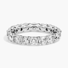 a white gold ring with round cut diamonds