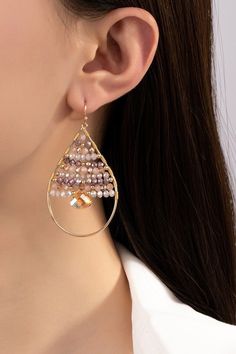 Make a statement with these funky Faceted Glass Beaded Teardrop Earrings! The wire-wrapped beads add a touch of whimsy to the classic teardrop shape, while the fishhook earwires make them easy and comfortable to wear. Perfect for any fashion-forward individual looking to add a fun pop of color to their outfit. size: 2.5"ships from USA Teardrop Beaded Earrings With Ear Wire For Party, Teardrop Beaded Earrings For Party, Wire Wrapped Teardrop Earrings For Party, Party Teardrop Beaded Earrings With Ear Wire, Party Beaded Teardrop Drop Earrings, Party Teardrop Beaded Metal Earrings, Party Beaded Teardrop Earrings, Party Teardrop Beaded Earrings, Party Teardrop Colorful Beaded Earrings