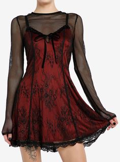 This twofer dress is giving vampire romance. This gothic piece features a red slip dress with a black floral lace overlay and bow detailing at the chest. Comes with a fishnet long-sleeve underneath and adjustable straps. Twofer Dress, Vampire Dress, Velvet Slip Dress, Red Slip Dress, Goth Dress, Romantic Lace, Gothic Dress, Gothic Outfits, Red Lace