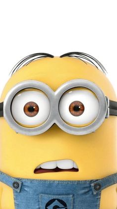 a close up of a minion with big eyes