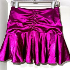 Betsey Johnson Vintage Sample Piece Grape Colored Satin Skirt From The Betseyville Fall 2004 Collection! This Skirt Has A Zip Closure In The Back. It Has The Original Sample Showroom Tag. Women’s Size 4. Please Note, This Is A Sample Piece From The Early 2000’s And Perfect For Any Betsey Collector!! Ruched Flowy Skirt For Party, Silk Ruched Skirt For Party, Elegant Fitted Skort With Gathered Skirt, Fitted Skort For Cocktail Occasions, Silk Fitted Mini Skirt For Party, Flirty Pleated Skirt For Party, Fitted Ruffled Mini Skirt For Evening, Fitted Silk Mini Skirt For Evening, Pink Silk Skirt For Cocktail