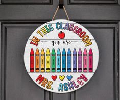 a sign that says in this classroom you are crayons