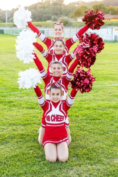 the cheerleaders are posing in their red and white outfits with pom poms