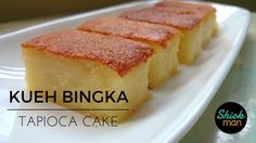 a piece of cake on a plate with the words kueh bicka written above it