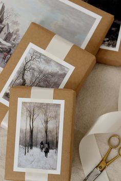 some pictures and scissors on a table with white paper in front of them that says diy project winter scene painting gift toppers