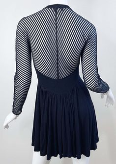 For Sale on 1stDibs - Sexy 1990s BYRON LARS black long sleeve mini skater dress ! Features sheer striped long sleeves and back. Simply slips on and stretches to fit. Pleating Fitted Striped Mini Dress With Long Sleeves, Striped Fitted Long Sleeve Mini Dress, Striped Fitted Mini Dress With Long Sleeves, Striped Long Sleeve Fitted Mini Dress, Striped Long Sleeve Evening Dress, Byron Lars, Mini Skater Dress, 90s Dress, Long Sleeve Mini