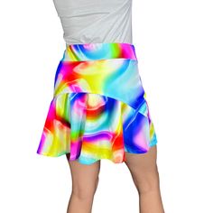 Step up your game in this fun neon rainbow poly orb print athletic golf skort with built in compression shorts and pockets.  This golf, tennis, running or sports skirt is flutter-style with a peplum in the back. It allows for plenty of movement and made of high quality performance spandex. The compression shorts are uniquely designed to be incredibly comfortable and won't ride up during activity. The 2 pockets are positioned on the sides of the shorts, and will fit your phone, keys, ID, etc.  *P Playful Multicolor Sports Shorts, Fitted Summer Skort For Pickleball, Summer Multicolor Skort With Built-in Shorts, Summer Cheerleading Skort, Fitted Bottoms For Pickleball In Summer, Multicolor Short Mini Skirt For Beach, Casual Multicolor Short Mini Skirt, Casual Summer Cheerleading Skort, Casual Stretch Multicolor Skort