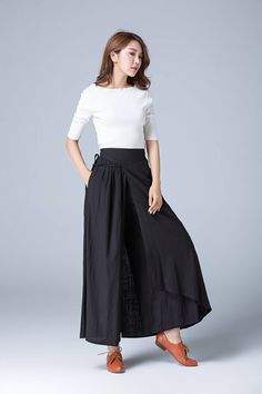 "Our black linen pants made from soft fabric has a layer, string belt on the right side make it a stylish one in the summer or fall. The linen pants style gives a skirt looking, in the summer, you can wear it as a casual skirt, party skirt or for the summer trip. Details: * black linen fabric * right zipper closure * side seam pockets * wrap pant, tie belt in the right side * ankle length * wash by hand or machine with cold water CUSTOM MADE SERVICE If you * Need a tailored clothes with your bod Black Linen Harem Pants For Spring, Black Cotton Wide Leg Culottes, Black Wide Leg Cotton Culottes, Black Linen Wide Leg Pants For Summer, Black Linen Wide Leg Bottoms, Black Linen Harem Pants For Summer, Summer Black Linen Harem Pants, High-waist Black Linen Wide Leg Pants, Black Summer Ankle-length Culottes